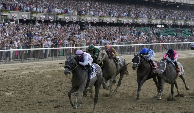 Arcangelo, with jockey Javier Castellano, crosses the finish line to win the 155th running of the Belmont Stakes horse race, Saturday, June 10, 2023, at Belmont Park in Elmont, N.Y. (AP Photo/Seth Wenig) **FILE**