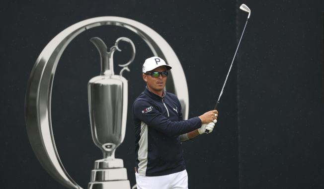 United States&#x27; Rickie Fowler tees off the 1st during a practice round for the British Open Golf Championships at the Royal Liverpool Golf Club in Hoylake, England, Tuesday, July 18, 2023. The Open starts Thursday, July 20. (AP Photo/Peter Morrison)