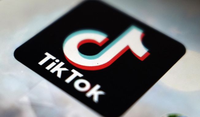 The TikTok app logo, in Tokyo, on Sept. 28, 2020. TikTok needs to do more to get ready for new European Union digital rules designed to keep users safe online, a top official said Tuesday July 18, 2023. (AP Photo/Kiichiro Sato, File)