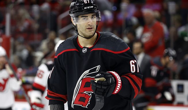 Carolina Hurricanes&#x27; Max Pacioretty (67) skates against the New Jersey Devils during the second period of an NHL hockey game in Raleigh, N.C., Tuesday, Jan. 10, 2023. With just a $1 million increase to the salary cap in 2023 and even more expected next year, short contracts like Pacioretty&#x27;s are a popular route for players and teams willing to take moderate risks and kick money down the road. (AP Photo/Karl B DeBlaker)