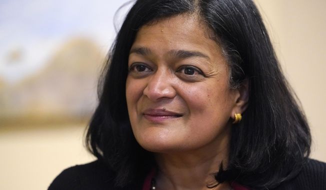 Rep. Pramila Jayapal, D-Wash., listens to a question during an interview Friday, Nov. 12, 2021, in Seattle. (AP Photo/Elaine Thompson)